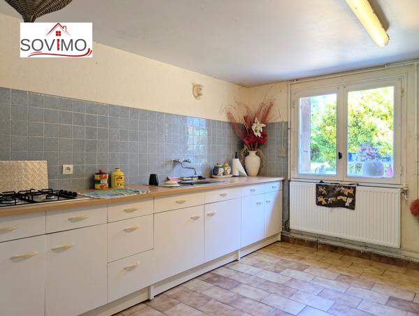 MAISON SUR SOUS-SOL SURÉLEVÉ AVEC JARDIN ARBORÉ ATTENANT ET GARAGE