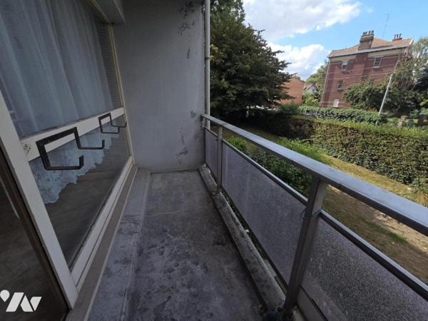 LOOS APPARTEMENT DE TYPE 2  DE 54.56 M2 AVEC BALCON -