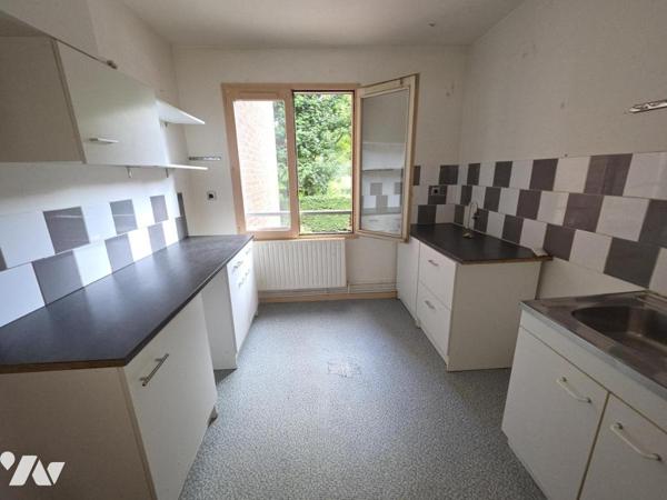 LOOS APPARTEMENT DE TYPE 2  DE 54.56 M2 AVEC BALCON -