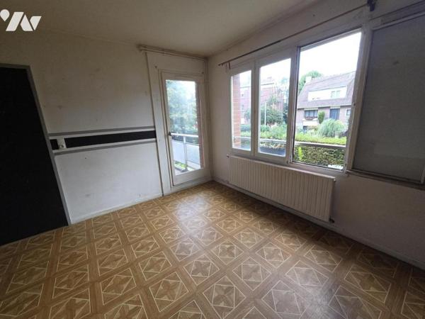 LOOS APPARTEMENT DE TYPE 2  DE 54.56 M2 AVEC BALCON -