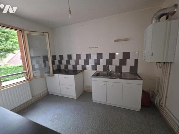 LOOS APPARTEMENT DE TYPE 2  DE 54.56 M2 AVEC BALCON -