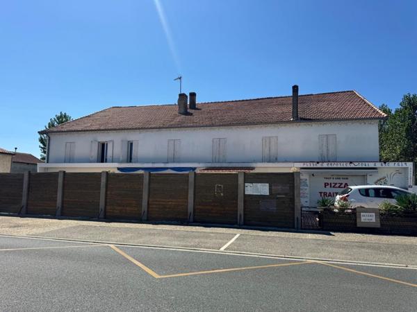 400 m² habitable + commerce – Idéal invest