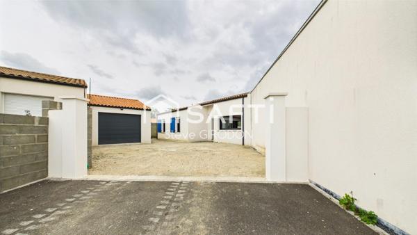 Maison coup de cœur avec garage pro récent !