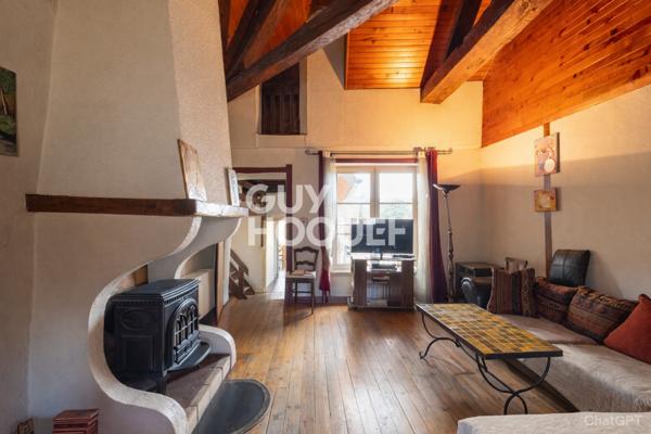 Maison de ville en pierre T4 de 121.2 m² avec jardin.