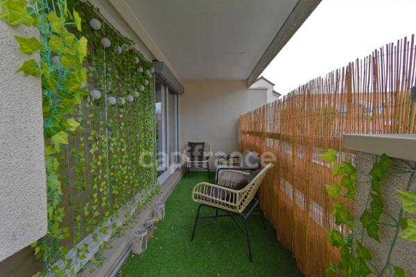 Houilles - Appartement 3 pièces de 68m2, centre-ville avec garage et terrasses de 28m2.