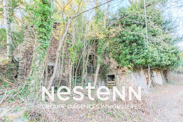 Curvalle Terrain boisé avec ancienne maison