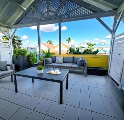 Appartement T3, meublé, vue mer, vaste terrasse, à vendre, LE MOULE AUTRE BORD (971)