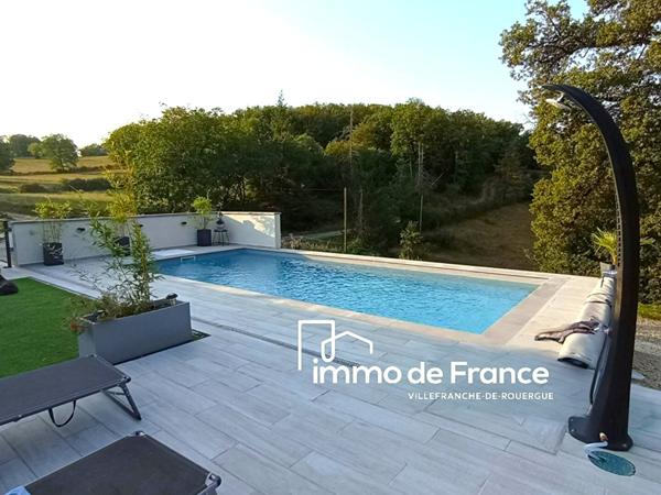 Maison  contemporaine 111 m²  3 chambres, garage + sous sol de 125 m², piscine, terrain de 1296 m²