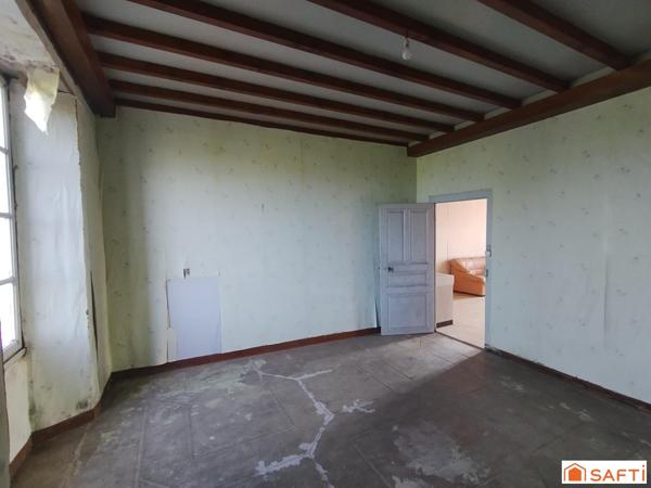 Rénovation à fort potentiel dans un cadre paisible