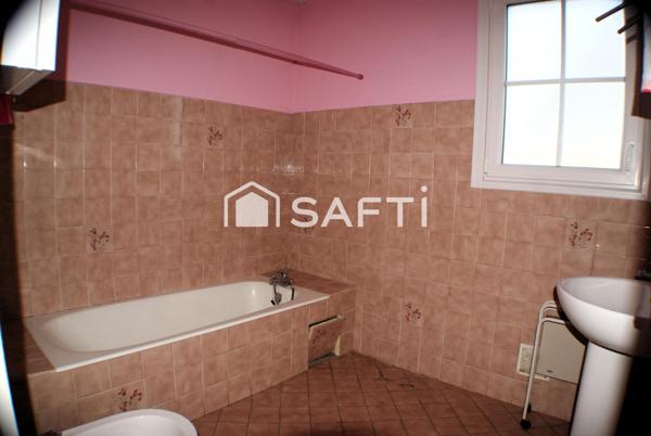 Maison 3 chambres, garage et terrain clos