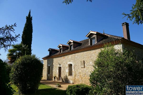 MAISON DE MAITRE 200 m2 ET SA GRANGE EN PIERRE à restaurer sur terrain 4.85 HA BASSE VALLE DU LOT 46700