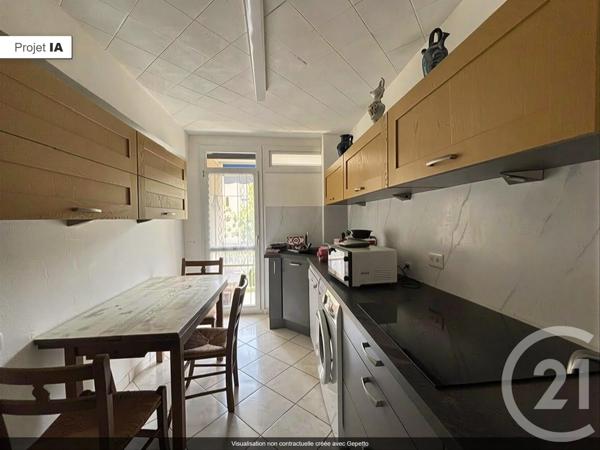 Appartement F3 à vendre  3 pièces - 61,51 m 2   ST GENIS LAVAL  - 69