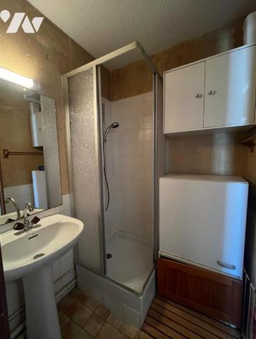 Un studio cabine de 17,84 m2 dans une résidence avec parking et piscine