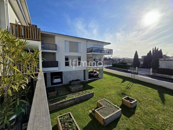 Appartement Type 3 récent avec balcon et parking couvert