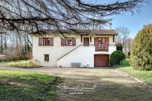 Maison de 90 m² avec jardin arboré