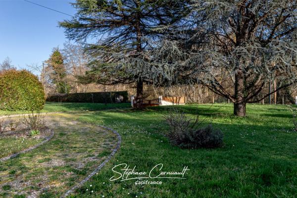 Maison de 90 m² avec jardin arboré