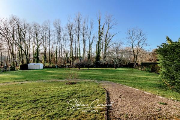 Maison de 90 m² avec jardin arboré