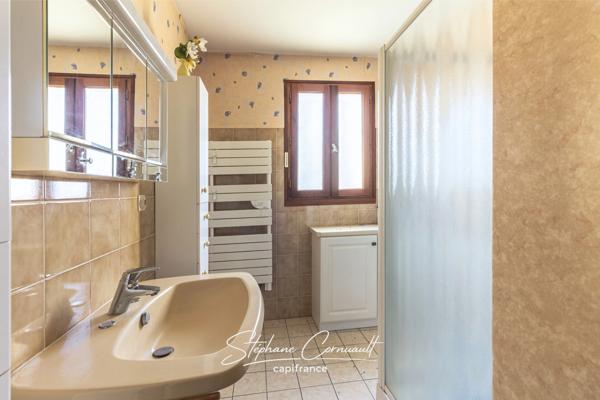 Maison de 90 m² avec jardin arboré