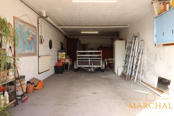 Appartement 130 m², grand garage, terrain