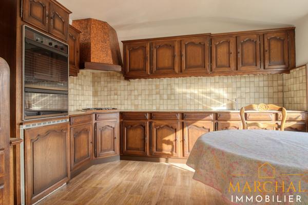 Appartement 130 m², grand garage, terrain