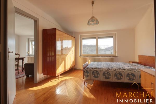 Appartement 130 m², grand garage, terrain