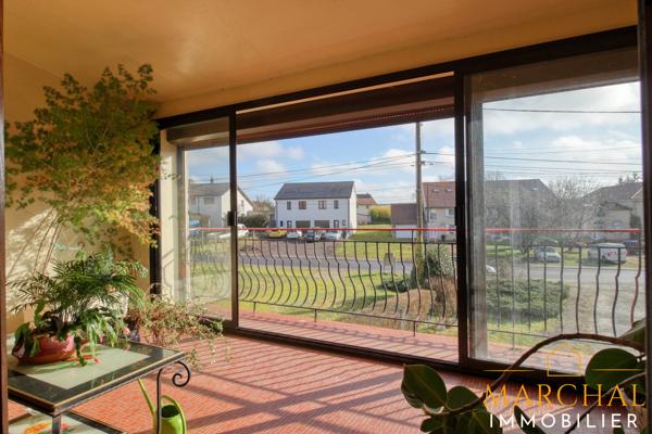 Appartement 130 m², grand garage, terrain