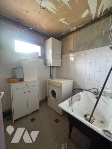 Maison d'habitation mitoyenne