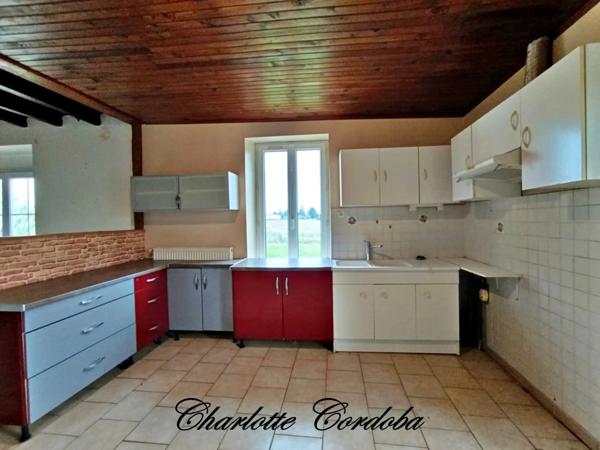 Maison en pierre avec garage et combles aménageables – charme et potentiel SERIGNAC SUR GARONNE