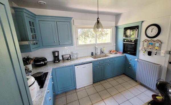 Maison 3 chambres, double garage, grand terrain constructible de 1524m2