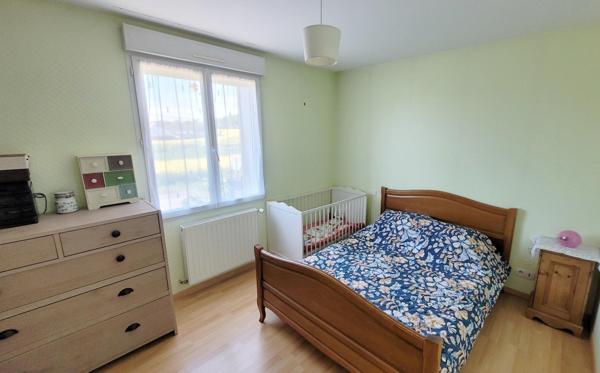 Maison 3 chambres, double garage, grand terrain constructible de 1524m2