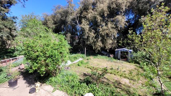 Maison 3 chambres, double garage, grand terrain constructible de 1524m2