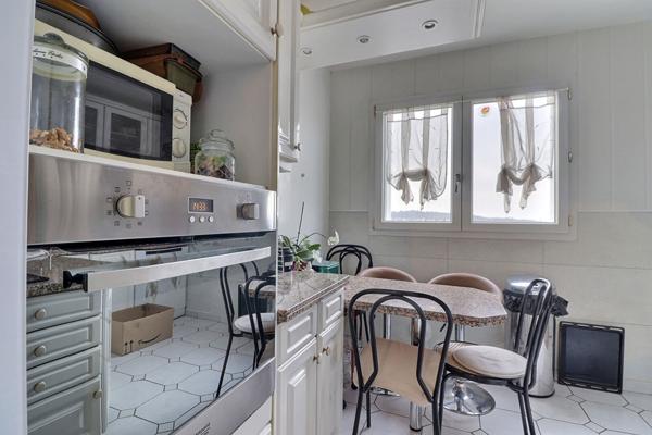 Appartement 4 pièce(s) 75.05 m2+ CAVE+ PLACE DE PARKING