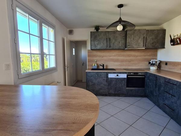 MAISON DE PLAIN PIED A PERIGNAT LES SARLIEVE