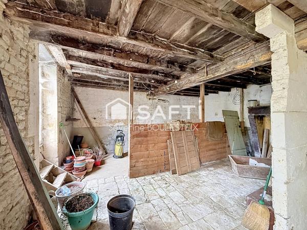 Maison en pierre avec grange attenante