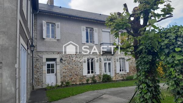 Maison de 258m², 8 pièces et jardinet