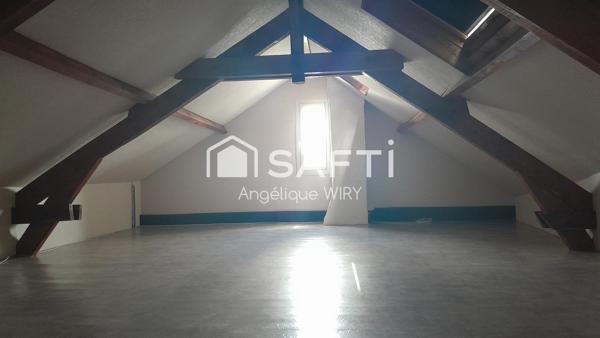 Maison de 258m², 8 pièces et jardinet