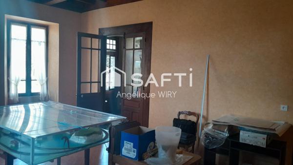 Maison de 258m², 8 pièces et jardinet