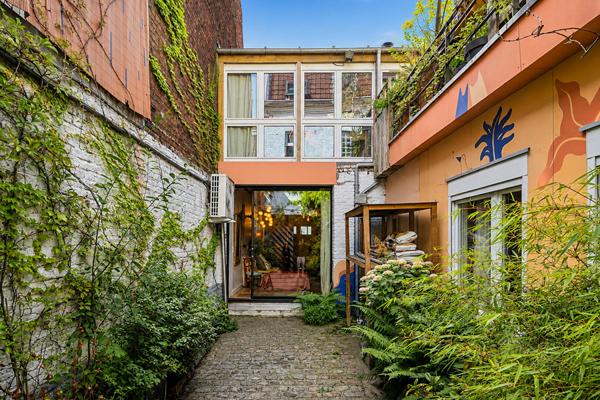 Loft avec terrasse paysagée dans une ancienne maison-boutique ouvrière