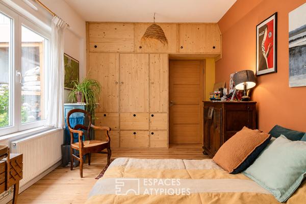 Loft avec terrasse paysagée dans une ancienne maison-boutique ouvrière