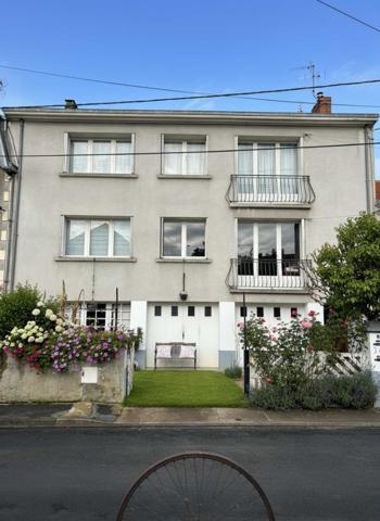 Maison ancienne - Perigueux Immeuble de rapport évolutif de 200 m2 habitable avec garages, jardin et potentiel d’aménagement