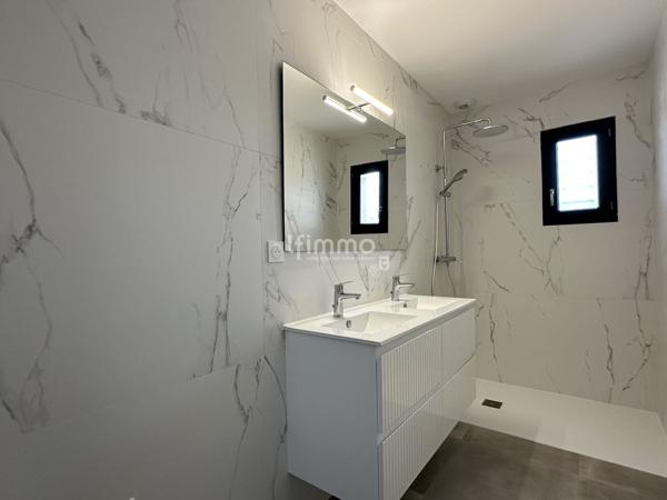 Un bel équilibre entre confort et intimité maison T4 plain pied