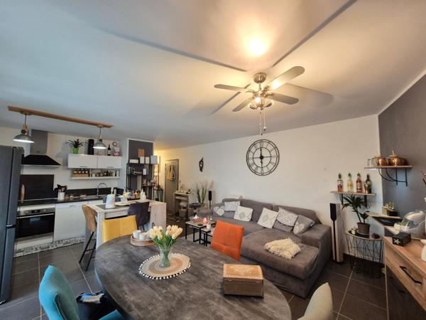 Appartement T2 de 55m2 avec jardinet et place de parking