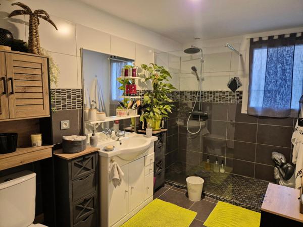 Appartement T2 de 55m2 avec jardinet et place de parking