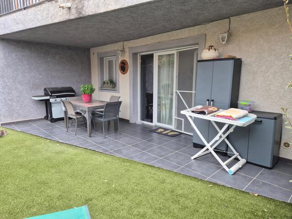 Appartement T2 de 55m2 avec jardinet et place de parking