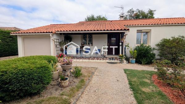 Maison chouchoutée avec garage et joli jardin