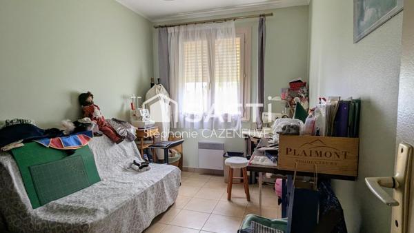 Maison chouchoutée avec garage et joli jardin