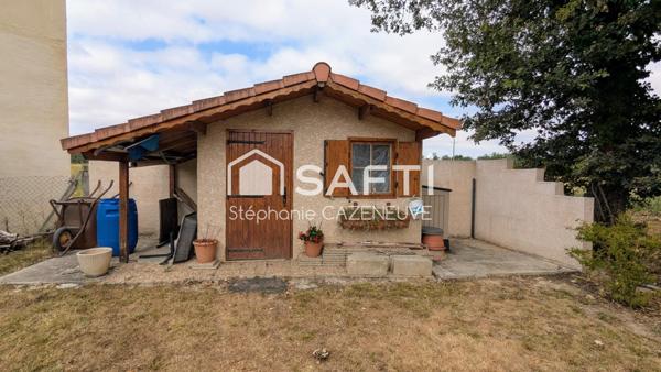 Maison chouchoutée avec garage et joli jardin