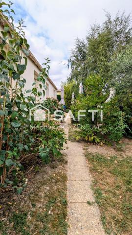 Maison chouchoutée avec garage et joli jardin