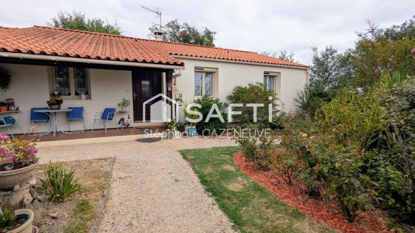 Maison chouchoutée avec garage et joli jardin