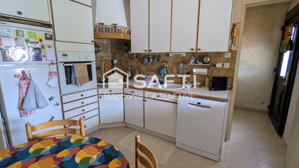 Maison chouchoutée avec garage et joli jardin